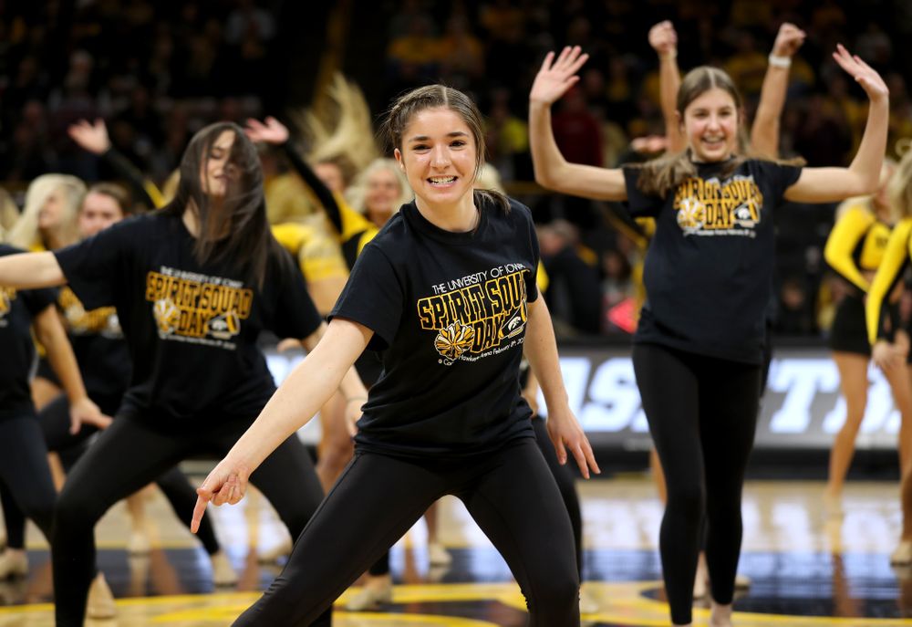 The Iowa Spirit Squad performs with participants in Spirit Squad Day at halftime of the Iowa Hawkeyes game against the Nebraska Cornhuskers Saturday, February 8, 2020 at Carver-Hawkeye Arena. (Brian Ray/hawkeyesports.com)