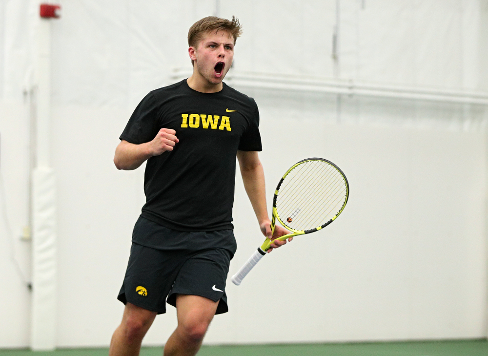 Iowa’s Will Davies celebrates a point during his singles match at the Hawkeye Tennis and Recreation Complex in Iowa City on Friday, March 6, 2020. (Stephen Mally/hawkeyesports.com)