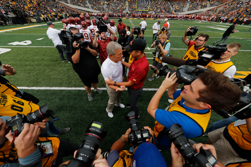 Iowa Hawkeyes head coach Kirk Ferentz talks with Iowa State Cyclones head coach Matt Campbell before their game Saturday, September 8, 2018 at Kinnick Stadium. (Brian Ray/hawkeyesports.com)