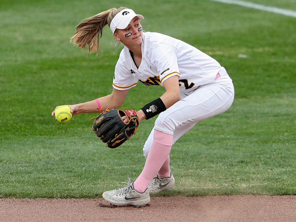Iowa second baseman Aralee Bogar (2) fields a ball before throwing to first base for an out during the first inning of their game against Iowa State at Pearl Field in Iowa City on Tuesday, Apr. 9, 2019. (Stephen Mally/hawkeyesports.com)