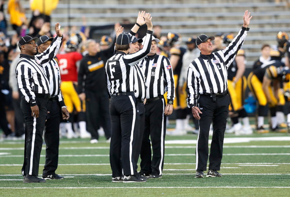 The officials wave to patients in the Stead Family Children's Hospital during Iowa Football's final spring practice Friday, April 20, 2018 at Kinnick Stadium. (Brian Ray/hawkeyesports.com)