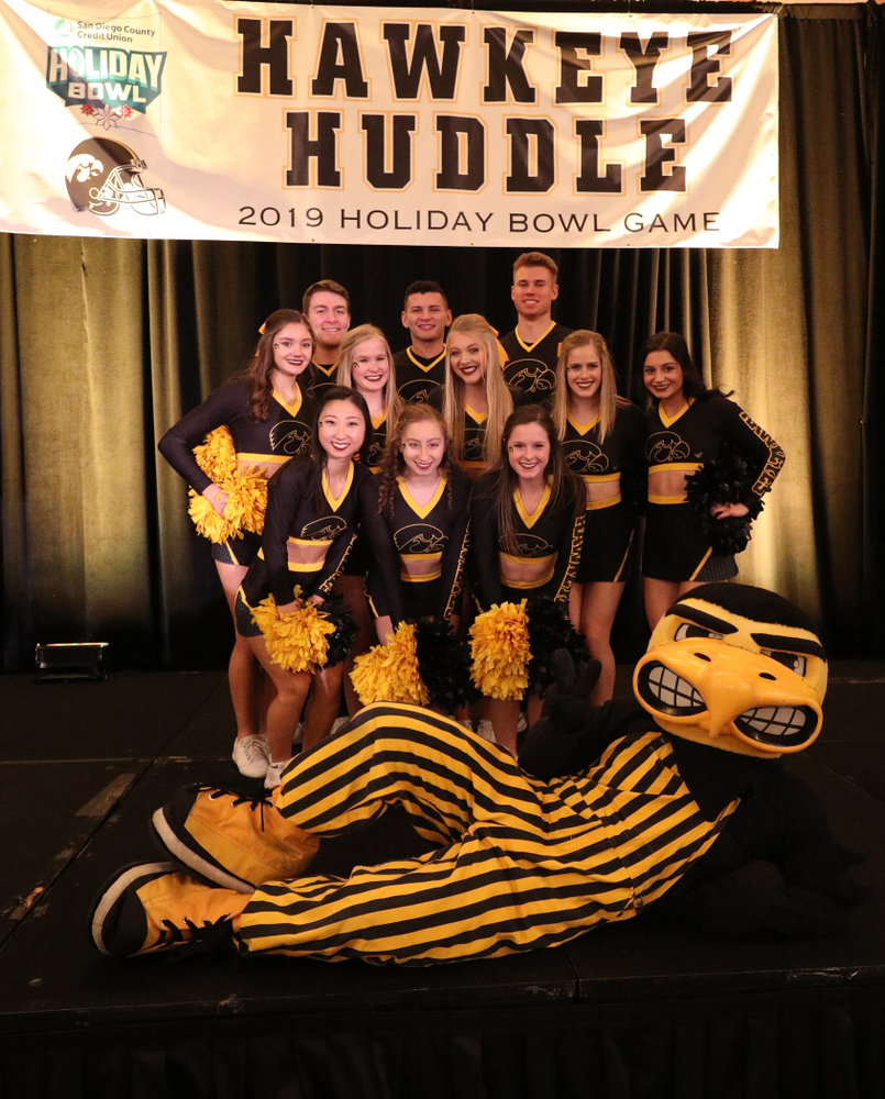 The Hawkeye Marching Band and the Iowa Spirit Squads perform during the Holiday Bowl Hawkeye Huddle Thursday, December 26, 2019 at the Hilton in downtown San Diego. (Brian Ray/hawkeyesports.com)