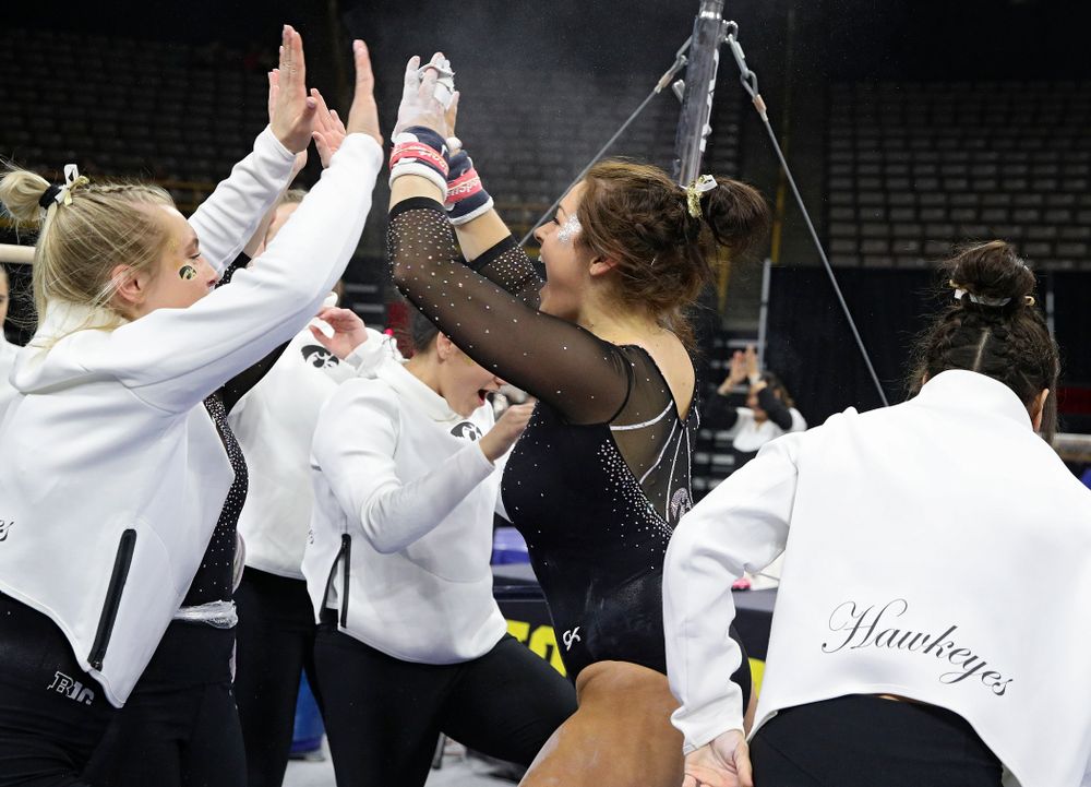 Iowa’s Erin Castle competes on the bars during their meet at Carver-Hawkeye Arena in Iowa City on Sunday, March 8, 2020. (Stephen Mally/hawkeyesports.com)