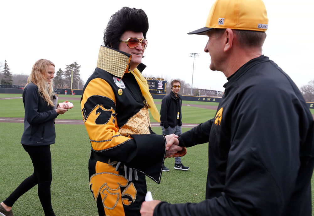 Hawkeye Elvis and head coach Rick Heller against the Bradley Braves Wednesday, March 28, 2018 at Duane Banks Field. (Brian Ray/hawkeyesports.com)