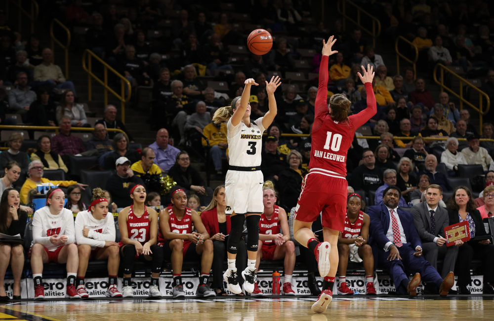 Iowa Hawkeyes guard Makenzie Meyer (3) knocks down a three point basket against the Wisconsin Badgers Monday, January 7, 2019 at Carver-Hawkeye Arena. (Brian Ray/hawkeyesports.com)