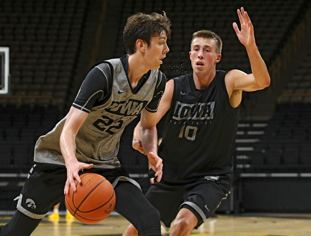 Iowa Hawkeyes forward Patrick McCaffery (22) drives in on guard Joe Wieskamp (10) during practice at Carver-Hawkeye Arena in Iowa City on Monday, Sep 30, 2019. (Stephen Mally/hawkeyesports.com)