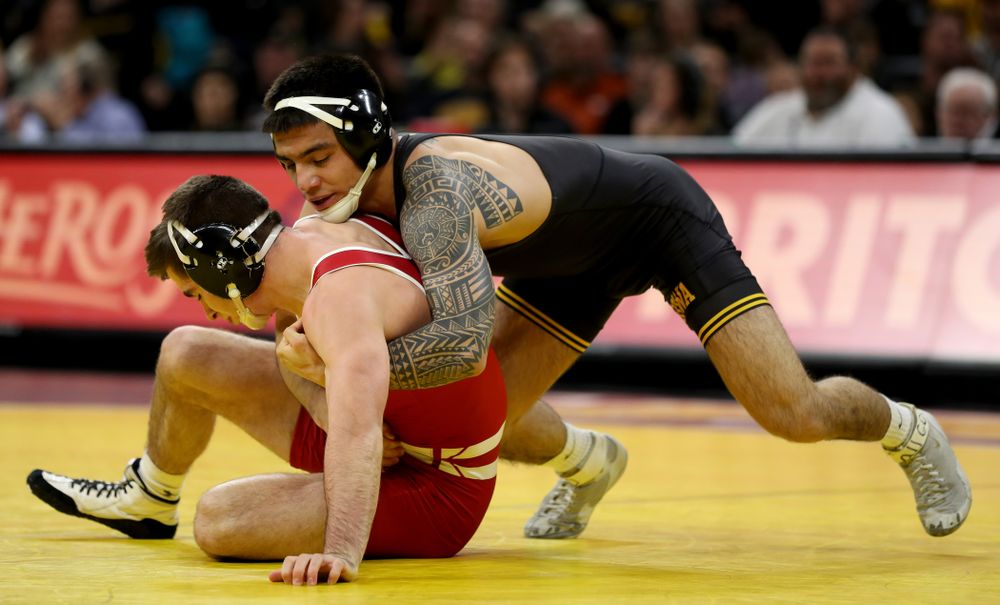 IowaÕs Pat Lugo wrestles WisconsinÕs Cole Martin at 149 pounds Sunday, December 1, 2019 at Carver-Hawkeye Arena. Lugo won the match 5-3. (Brian Ray/hawkeyesports.com)