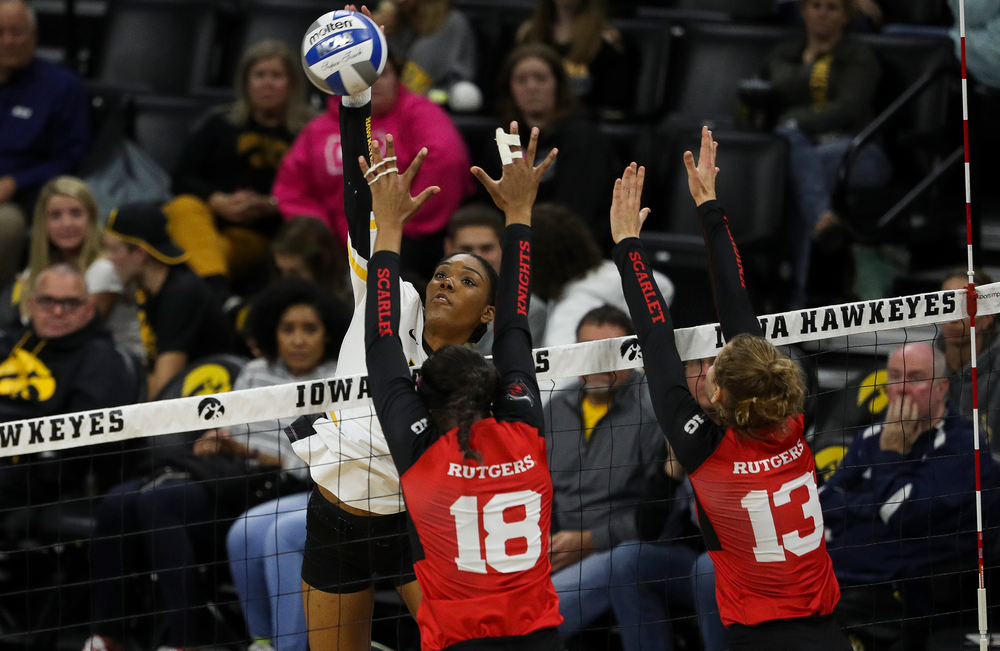 Iowa Hawkeyes outside hitter Taylor Louis (16) spikes the ball during a match against Rutgers at Carver-Hawkeye Arena on November 2, 2018. (Tork Mason/hawkeyesports.com)