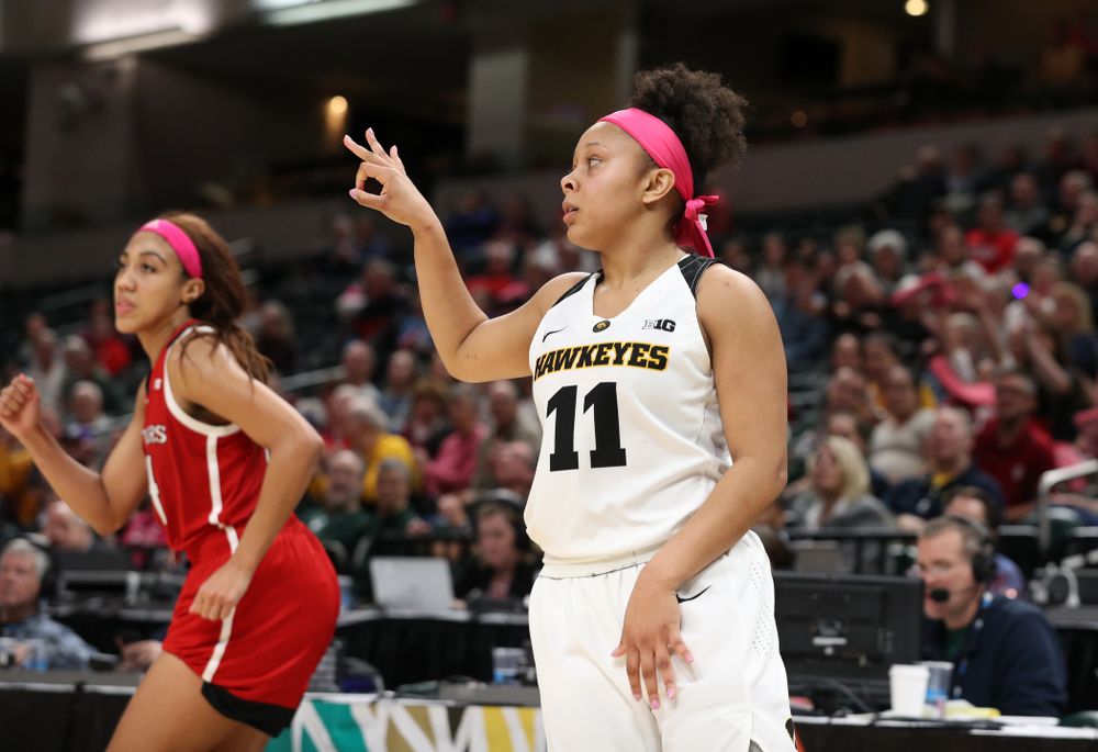 Iowa Hawkeyes guard Makenzie Meyer (3) celebrates a three point basket against the Rutgers Scarlet Knights in the semi-finals of the Big Ten Tournament Saturday, March 9, 2019 at Bankers Life Fieldhouse in Indianapolis, Ind. (Brian Ray/hawkeyesports.com)