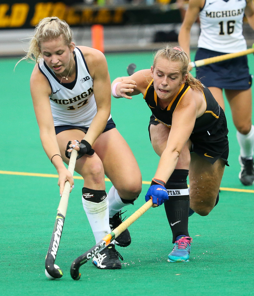 Iowa Hawkeyes midfielder Katie Birch (11) defends during a game against Michigan at Grant Field on October 5, 2018. (Tork Mason/hawkeyesports.com)
