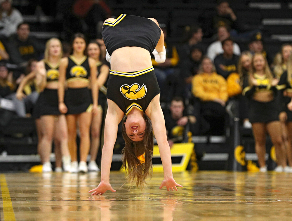 Iowa Cheerleaders do backflips down the court during the second half of their exhibition game against Lindsey Wilson College at Carver-Hawkeye Arena in Iowa City on Monday, Nov 4, 2019. (Stephen Mally/hawkeyesports.com)