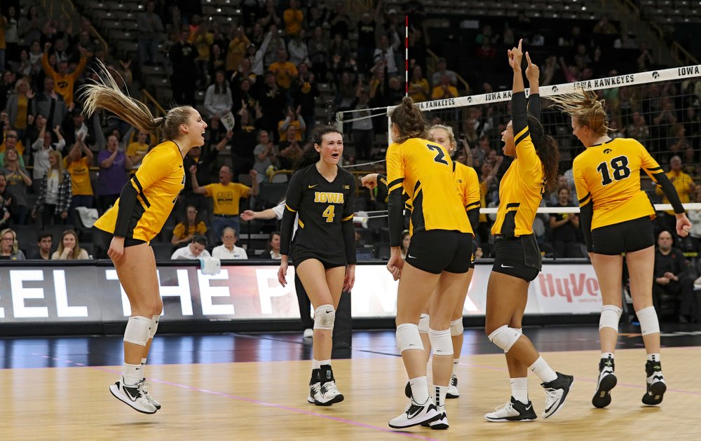 Iowa’s Maddie Slagle (15), Halle Johnston (4), Courtney Buzzerio (2), Kyndra Hansen (8), Brie Orr (7), and Hannah Clayton (18) celebrate a score during their match at Carver-Hawkeye Arena in Iowa City on Sunday, Oct 20, 2019. (Stephen Mally/hawkeyesports.com)