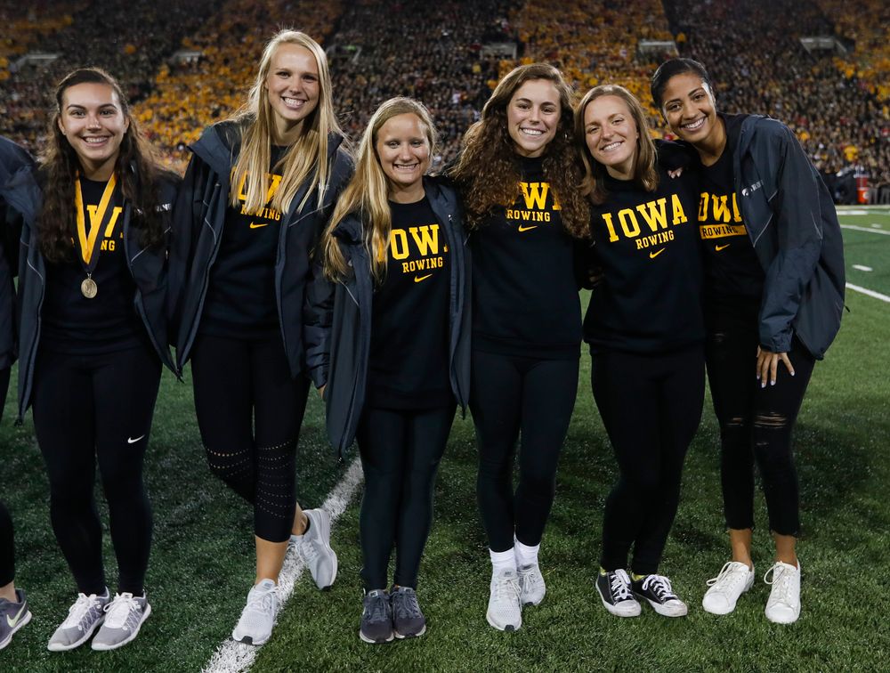 Members of the Iowa rowing team are recognized by the Presidential Committee on Athletics at halftime during a game against Wisconsin on September 22, 2018. (Tork Mason/hawkeyesports.com)