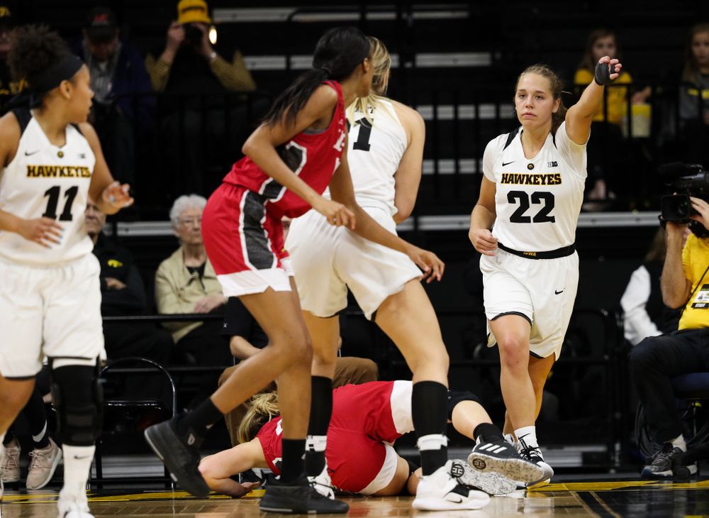 Iowa Hawkeyes guard Kathleen Doyle (22) signals Iowa ball against the IUPUI Jaguars Saturday, December 8, 2018 at Carver-Hawkeye Arena. (Brian Ray/hawkeyesports.com)