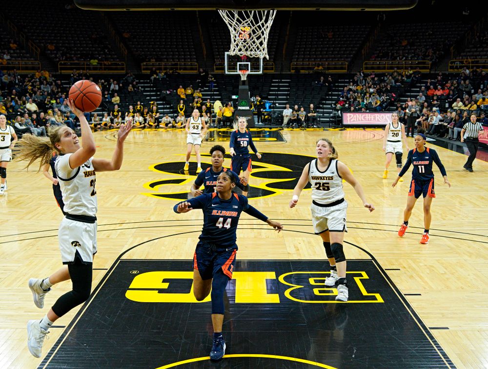 Iowa Hawkeyes guard Kathleen Doyle (22) takes a pass and scores during the fourth quarter of their game at Carver-Hawkeye Arena in Iowa City on Tuesday, December 31, 2019. (Stephen Mally/hawkeyesports.com)