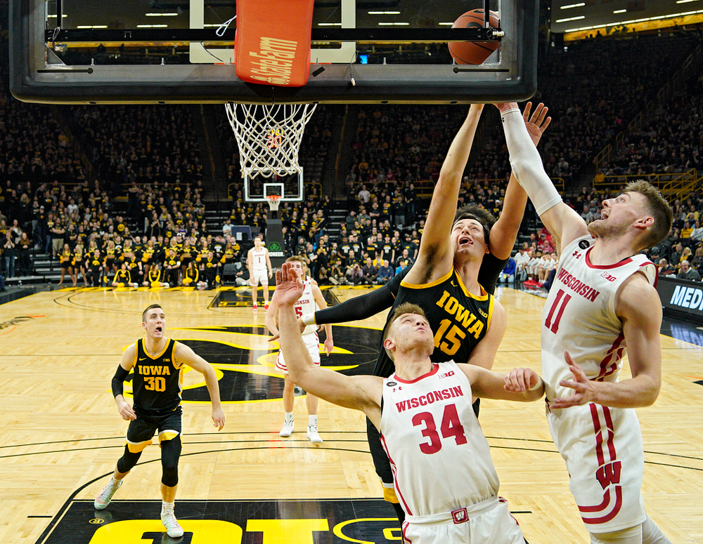 Iowa Hawkeyes forward Ryan Kriener (15) battles for a rebound during the first half of their game at Carver-Hawkeye Arena in Iowa City on Monday, January 27, 2020. (Stephen Mally/hawkeyesports.com)
