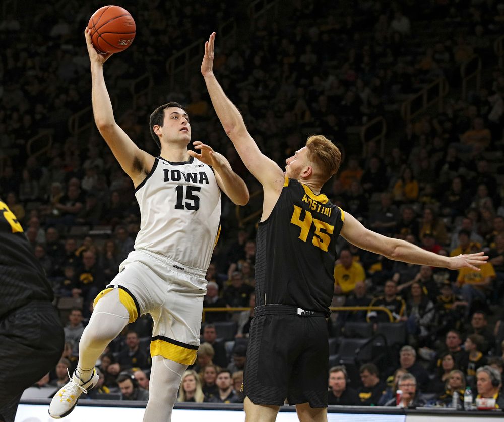 Iowa Hawkeyes forward Ryan Kriener (15) hooks in a basket during the second half of their their game at Carver-Hawkeye Arena in Iowa City on Sunday, December 29, 2019. (Stephen Mally/hawkeyesports.com)