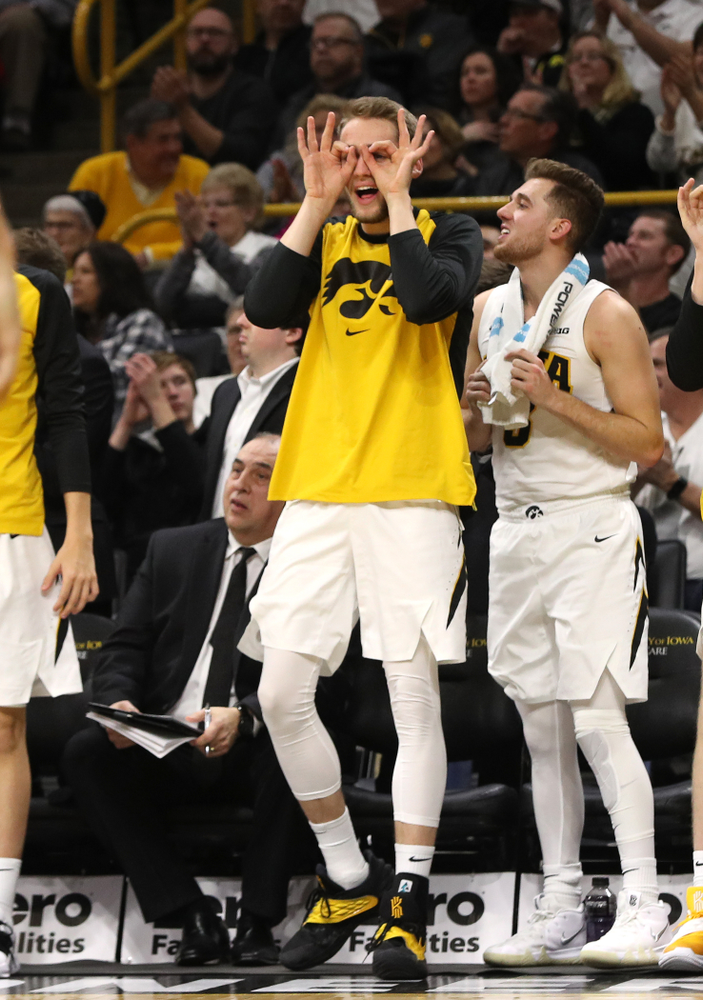 Iowa Hawkeyes forward Riley Till (20) celebrates a three point basket against the Illinois Fighting Illini Sunday, January 20, 2019 (Brian Ray/hawkeyesports.com)