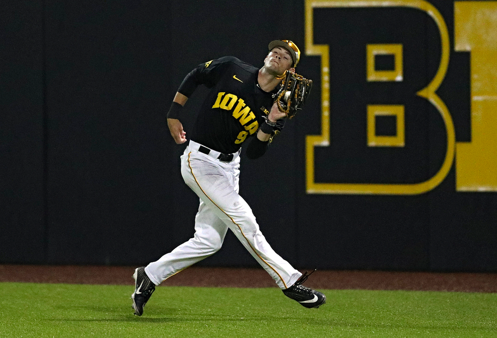 Iowa Hawkeyes right fielder Ben Norman (9) pulls in a fly ball for an out during the ninth inning of their game against Western Illinois at Duane Banks Field in Iowa City on Wednesday, May. 1, 2019. (Stephen Mally/hawkeyesports.com)