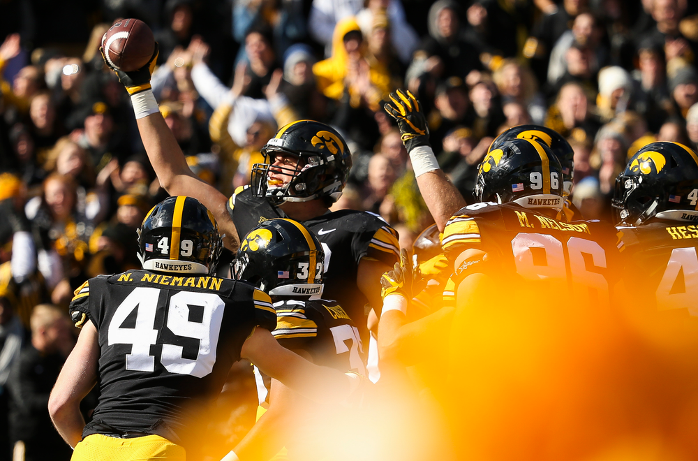Iowa Hawkeyes defensive end Anthony Nelson (98) celebrates after scoring a touchdown during a game against Maryland at Kinnick Stadium on October 20, 2018. (Tork Mason/hawkeyesports.com)