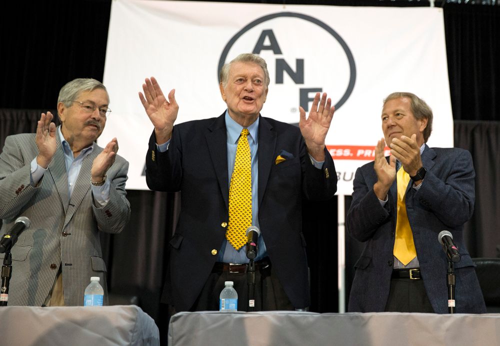 Former Hawkeye Football head coach Hayden Fry stands with new University of Iowa President Bruce Harreld, and Governor Terry Branstad during FryFest Friday, Sept. 4, 2015 at the Coralville Marriott Hotel and Convention Center. Branstad honored Fry with a proclamation commemorating his creation of the ANF logo and his support of Iowa farmers. (Brian Ray/hawkeyesports.com)
