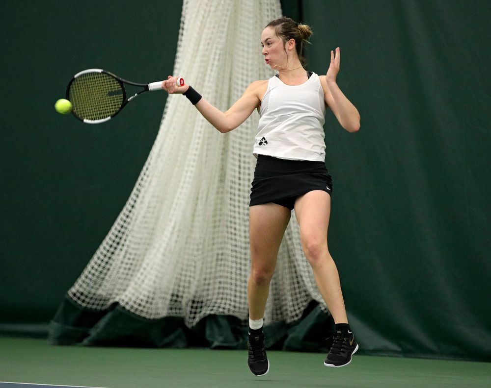 Iowa’s Samantha Mannix returns a shot during her doubles match at the Hawkeye Tennis and Recreation Complex in Iowa City on Sunday, February 23, 2020. (Stephen Mally/hawkeyesports.com)