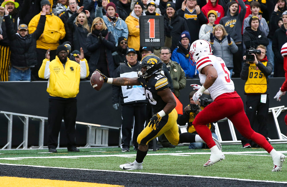 Iowa Hawkeyes running back Mekhi Sargent (10) scores a touchdown during a game against Nebraska at Kinnick Stadium on November 23, 2018. (Tork Mason/hawkeyesports.com)