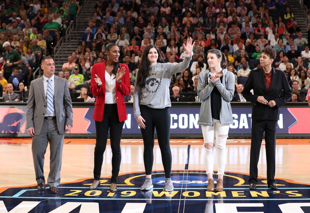 Iowa Hawkeyes forward Megan Gustafson (10) is introduced with Lisa Leslie and the other members of the Naismith Starting 5 during a timeout in the second half of the National Semi-Final between Baylor and Oregon Friday, April 5, 2019 at Amalie Arena in Tampa, FL. (Brian Ray/hawkeyesports.com)