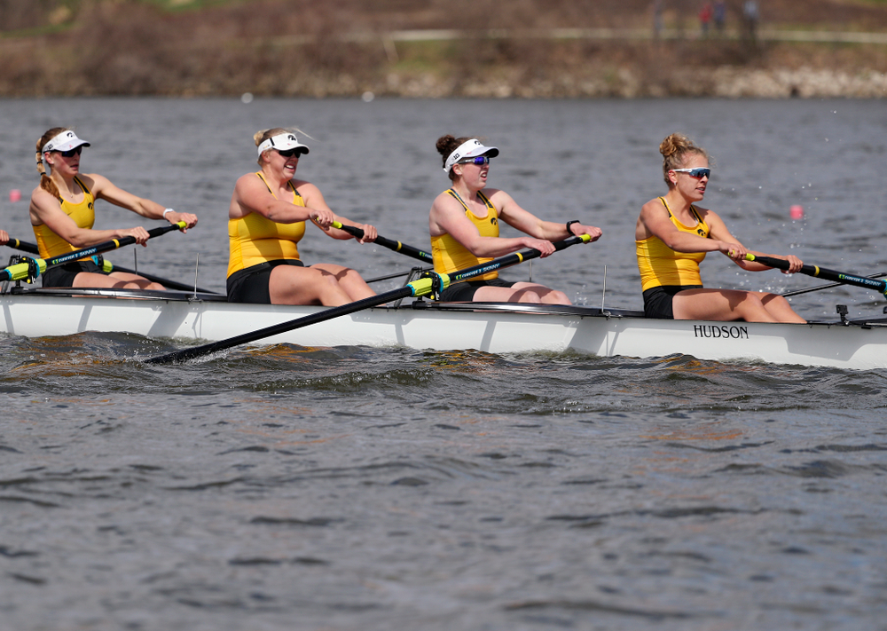 Iowa's Hunter Koenigsfeld (from left), Contessa Harold, Katie Pearson, and Eve Stewart during their 1 Varsity 8 race against Wisconsin in their Big Ten Double Dual Rowing Regatta at Lake Macbride in Solon on Saturday, Apr. 13, 2019. (Stephen Mally/hawkeyesports.com)