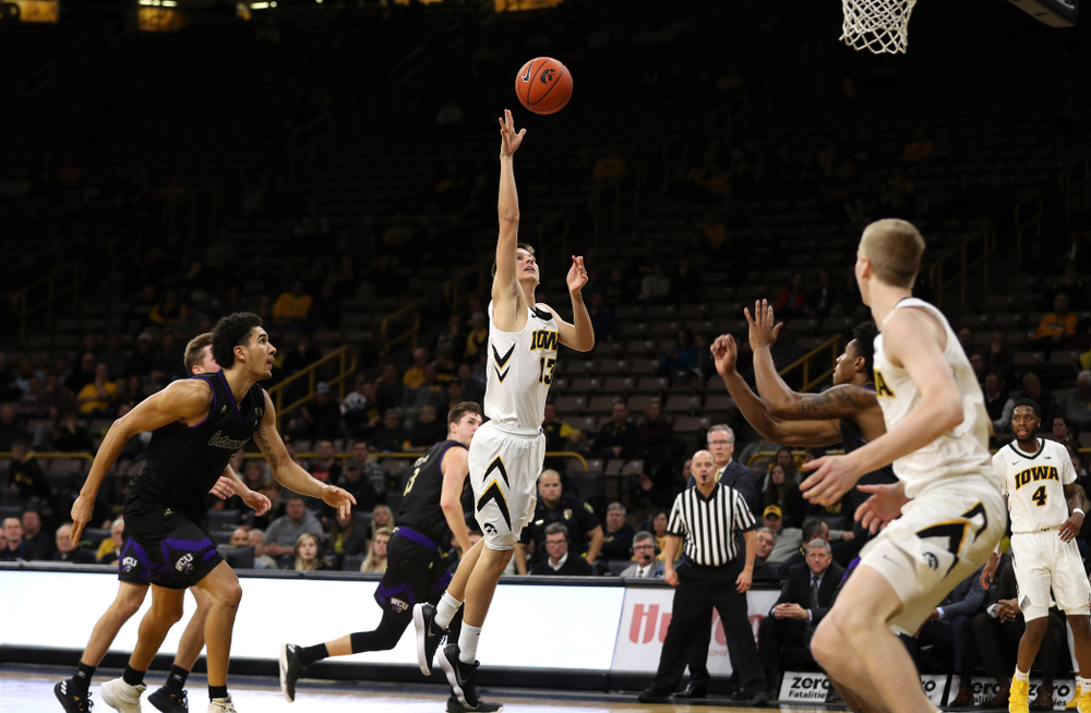Iowa Hawkeyes guard Austin Ash (13) against the Western Carolina Catamounts Tuesday, December 18, 2018 at Carver-Hawkeye Arena. (Brian Ray/hawkeyesports.com)