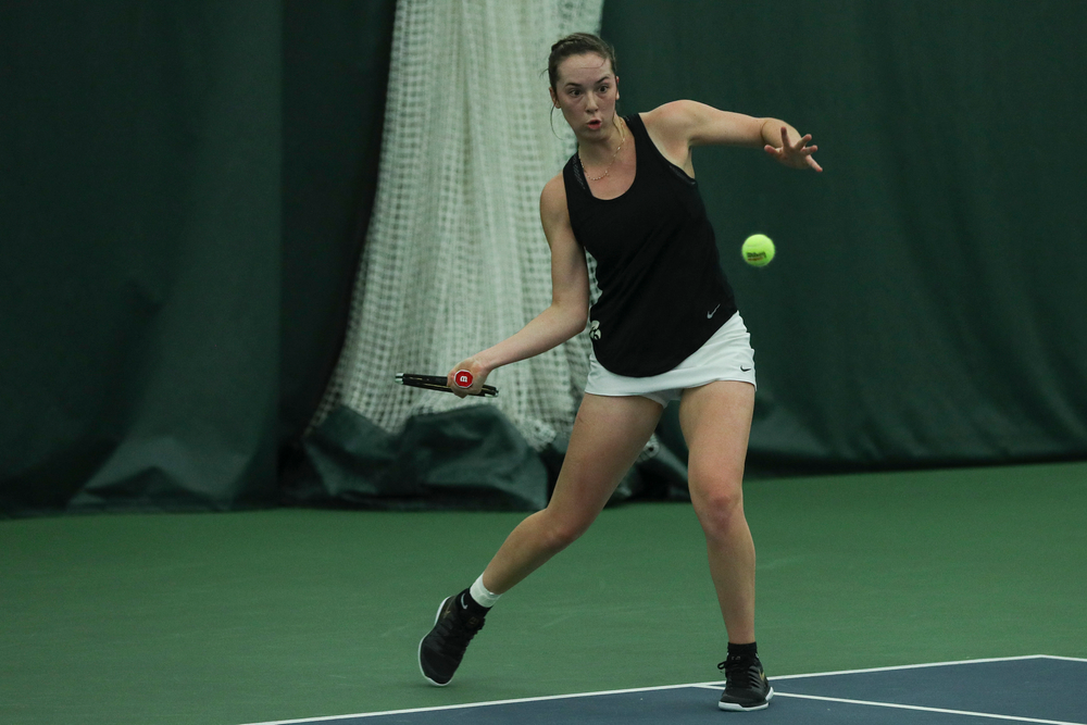 Iowa’s Samantha Mannix returns a hit during the Iowa women’s tennis meet vs DePaul on Friday, February 21, 2020 at the Hawkeye Tennis and Recreation Complex. (Lily Smith/hawkeyesports.com)