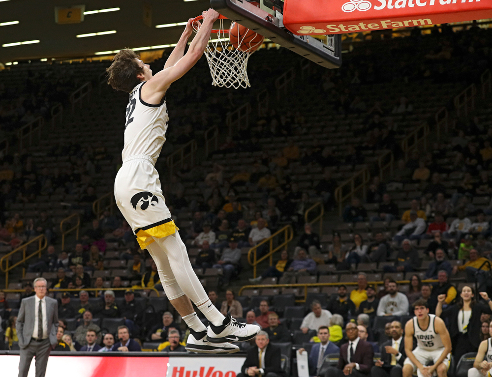 Iowa Hawkeyes forward Patrick McCaffery (22) dunks the ball during the second half of their exhibition game against Lindsey Wilson College at Carver-Hawkeye Arena in Iowa City on Monday, Nov 4, 2019. (Stephen Mally/hawkeyesports.com)