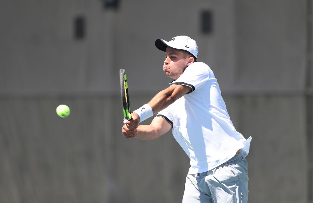 IowaÕs Will Davies against the Michigan Wolverines Sunday, April 21, 2019 at the Hawkeye Tennis and Recreation Complex. (Brian Ray/hawkeyesports.com)