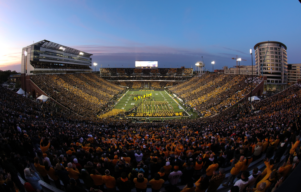 The Iowa Hawkeyes swarm the field against the Penn State Nittany Lions Saturday, October 12, 2019 at Kinnick Stadium. (Brian Ray/hawkeyesports.com)