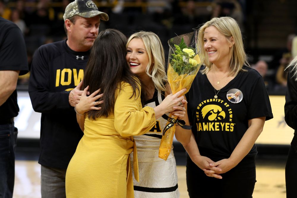 The Iowa Cheerleaders and Dance Team perform on senior night at half-time of the Iowa Hawkeyes game against the Purdue Boilermakers Tuesday, March 3, 2020 at Carver-Hawkeye Arena. (Brian Ray/hawkeyesports.com)