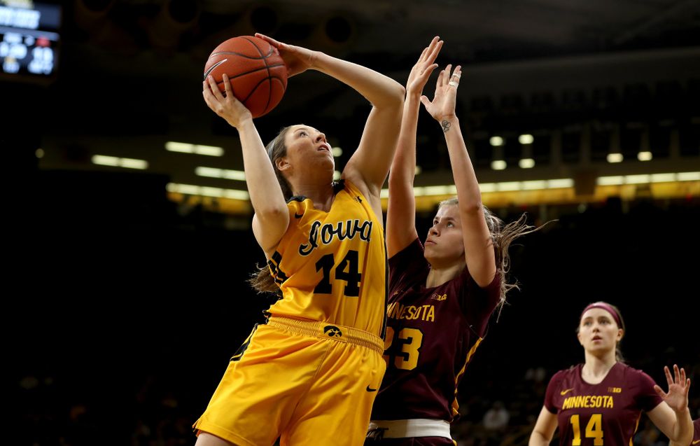 Iowa Hawkeyes forward McKenna Warnock (14) against the Minnesota Golden Gophers Thursday, February 27, 2020 at Carver-Hawkeye Arena. (Brian Ray/hawkeyesports.com)