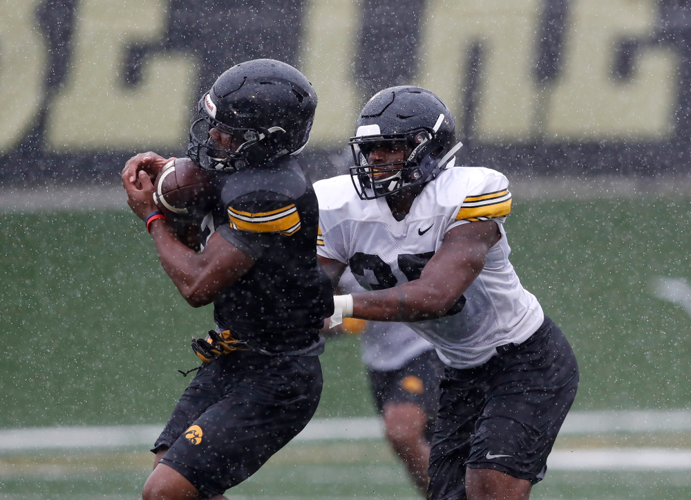 Iowa Hawkeyes wide receiver Tyrone Tracy Jr. (3) and linebacker Barrington Wade (35) during camp practice No. 15 Monday, August 20, 2018 at the Hansen Football Performance Center. (Brian Ray/hawkeyesports.com)