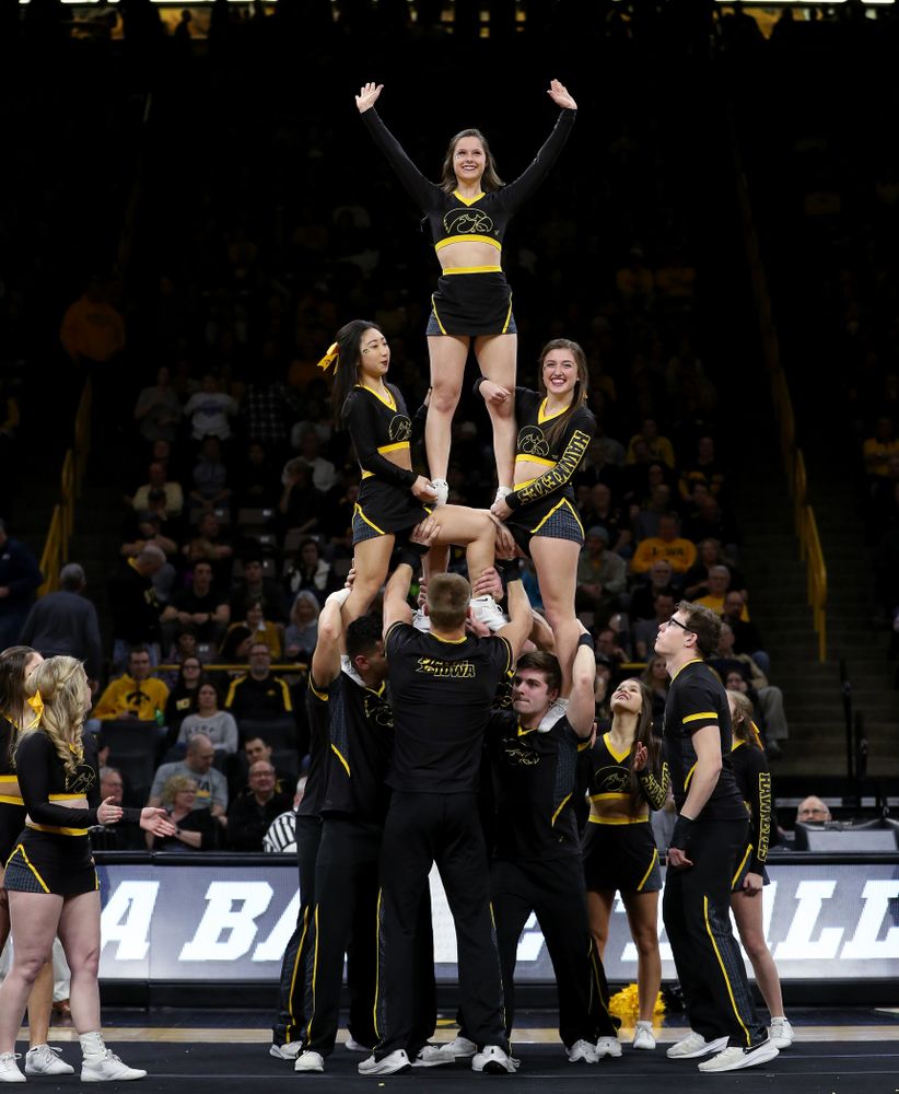 The Iowa Cheerleaders and Dance Team perform on senior night at half-time of the Iowa Hawkeyes game against the Purdue Boilermakers Tuesday, March 3, 2020 at Carver-Hawkeye Arena. (Brian Ray/hawkeyesports.com)