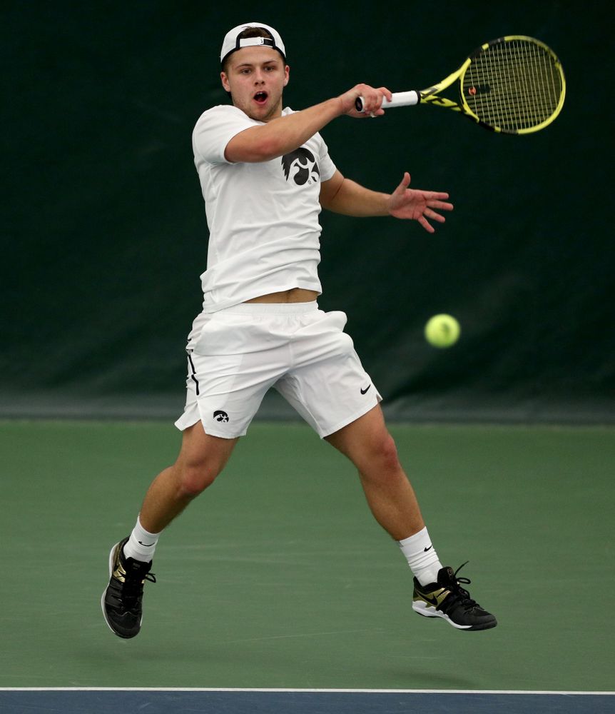 Iowa’s Will Davies against Cornell Sunday, March 8, 2020 at the Hawkeye Tennis and Recreation Center. (Brian Ray/hawkeyesports.com)