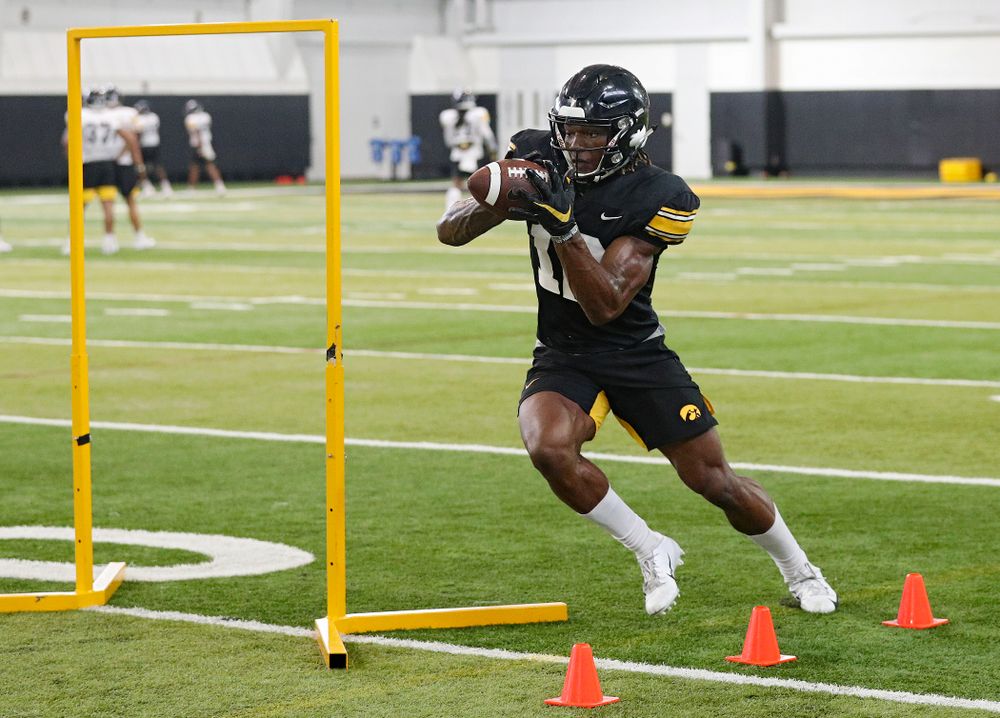 Iowa Hawkeyes wide receiver Brandon Smith (12) pulls in a pass during Fall Camp Practice No. 9 at the Hansen Football Performance Center in Iowa City on Monday, Aug 12, 2019. (Stephen Mally/hawkeyesports.com)