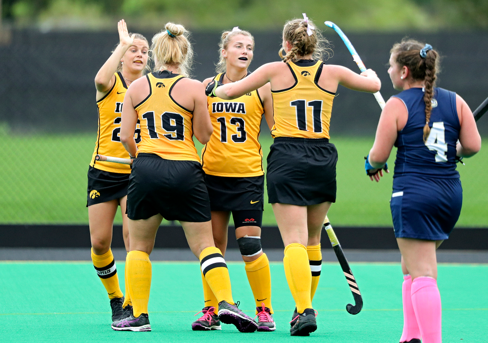 Iowa’s Leah Zellner (13) celebrates her goal with Maddy Murphy (26), Ryley Miller (19), and Katie Birch (11) during the first quarter of their game against UC Davis at Grant Field in Iowa City on Sunday, Oct 6, 2019. (Stephen Mally/hawkeyesports.com)