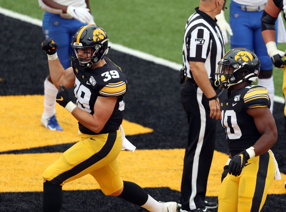 Iowa Hawkeyes tight end Nate Wieting (39) celebrates as running back Mekhi Sargent (10) scores against Middle Tennessee State Saturday, September 28, 2019 at Kinnick Stadium. (Brian Ray/hawkeyesports.com)