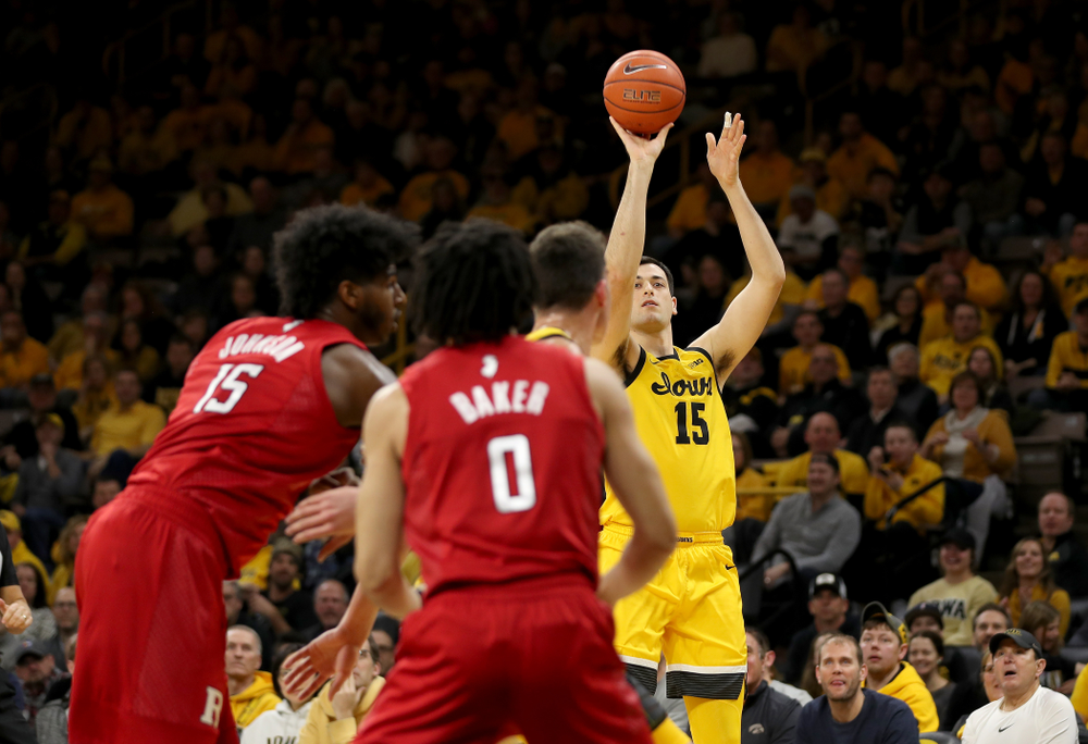 Iowa Hawkeyes forward Ryan Kriener (15) knocks down a three point basket against the Rutgers Scarlet Knights Wednesday, January 22, 2020 at Carver-Hawkeye Arena. (Brian Ray/hawkeyesports.com)