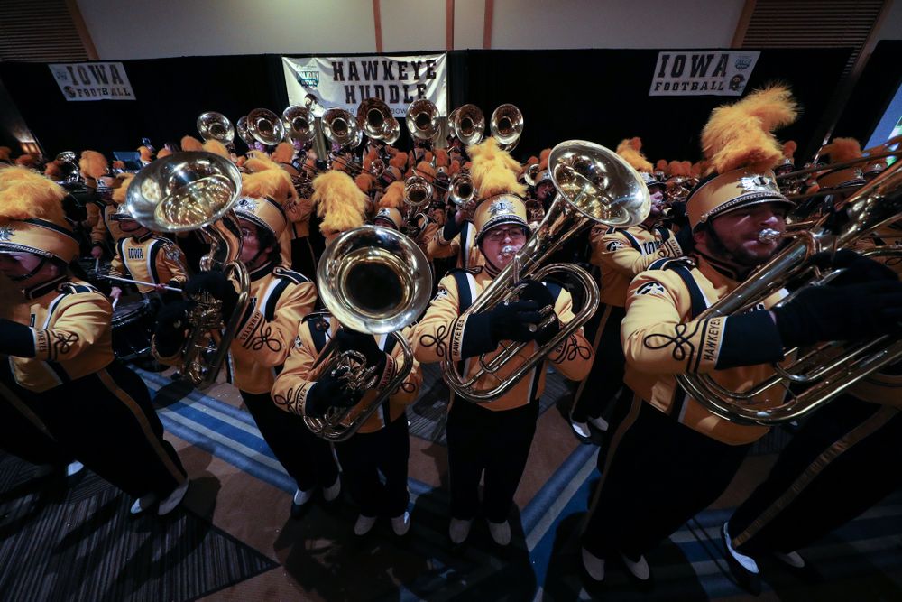 The Hawkeye Marching Band and the Iowa Spirit Squads perform during the Holiday Bowl Hawkeye Huddle Thursday, December 26, 2019 at the Hilton in downtown San Diego. (Brian Ray/hawkeyesports.com)