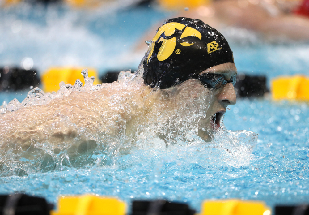 Iowa's Jackson Kuhlers swims the 200 yard butterfly during a double dual against Wisconsin and Northwestern Saturday, January 19, 2019 at the Campus Recreation and Wellness Center. (Brian Ray/hawkeyesports.com)