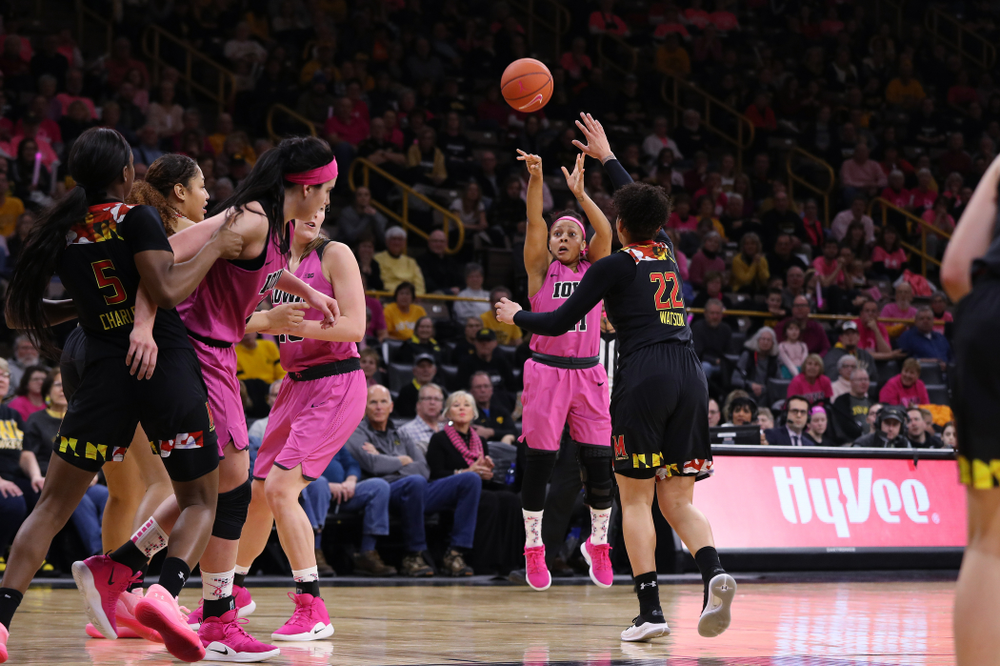 Iowa Hawkeyes guard Tania Davis (11) drains a three point basket against the seventh ranked Maryland Terrapins Sunday, February 17, 2019 at Carver-Hawkeye Arena. (Brian Ray/hawkeyesports.com)