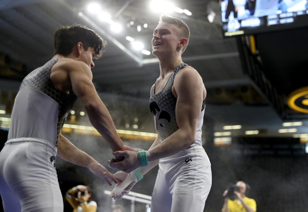 Iowa’s Carter Tope competes on the high bar against UIC and Minnesota Saturday, February 1, 2020 at Carver-Hawkeye Arena. (Brian Ray/hawkeyesports.com)