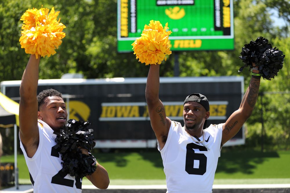Iowa Hawkeyes defensive back Kaevon Merriweather (26) and wide receiver Ihmir Smith-Marsette (6) during the 2019 Iowa Ladies Football Academy Saturday, June 8, 2019 at the Hansen Football Performance Center. (Brian Ray/hawkeyesports.com)