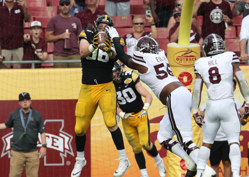 Iowa Hawkeyes defensive end Matt Nelson (96) breaks up an attempted two point conversion during the Outback Bowl Tuesday, January 1, 2019 at Raymond James Stadium in Tampa, FL. (Brian Ray/hawkeyesports.com)