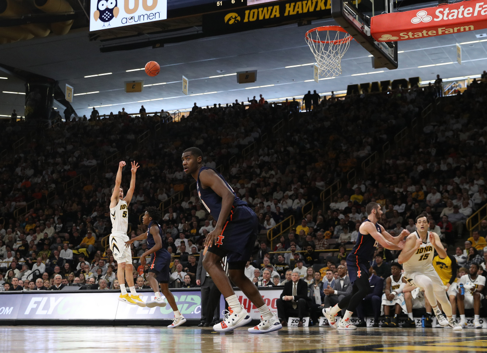 Iowa Hawkeyes forward Nicholas Baer (51) makes a three point basket against the Illinois Fighting Illini Sunday, January 20, 2019 at Carver-Hawkeye Arena. (Brian Ray/hawkeyesports.com)